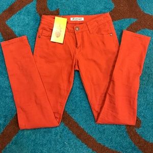 NWT rust color stretch skinny jeans.